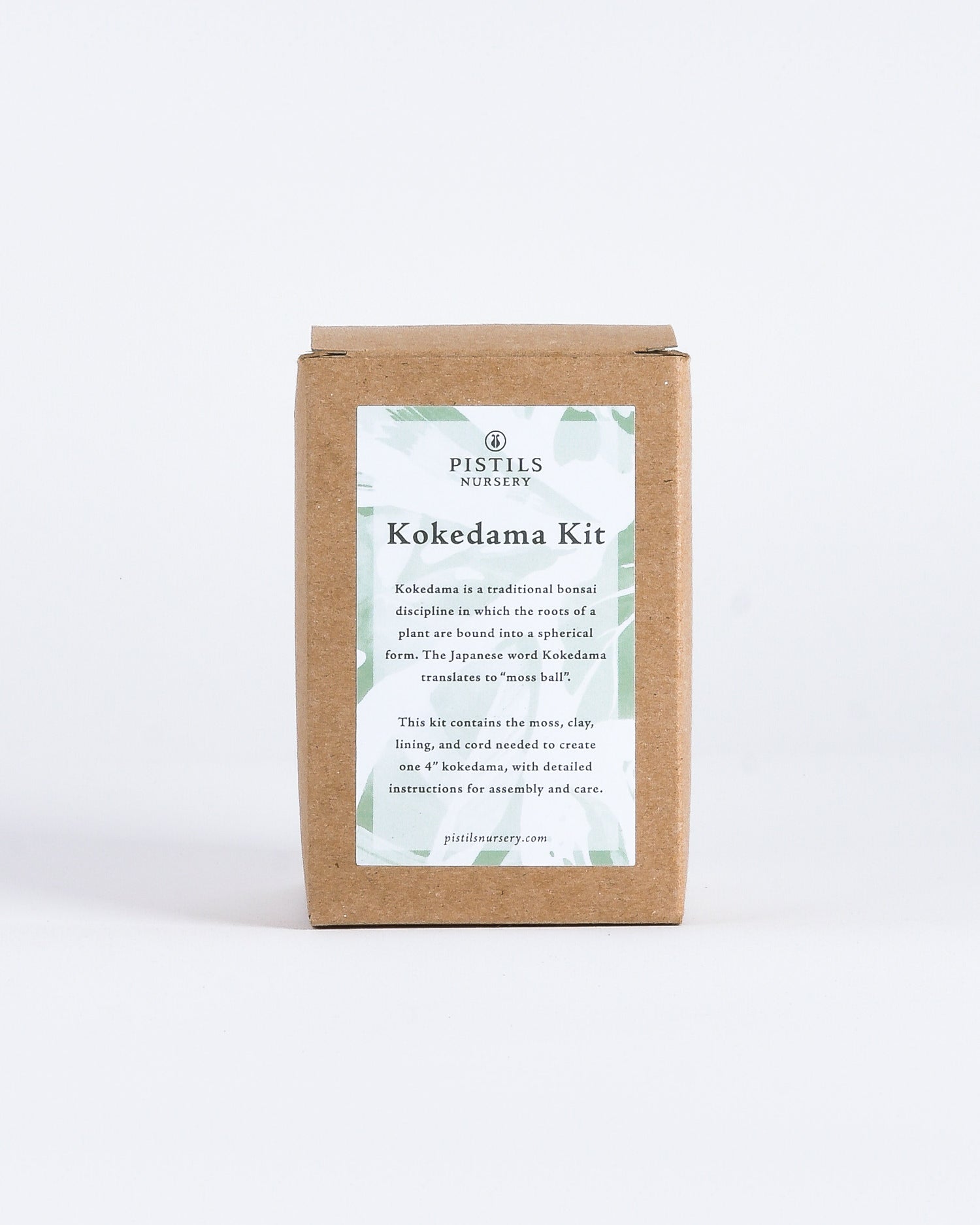 Brown Kokedama Kit with green Pistils Nursery label on the front