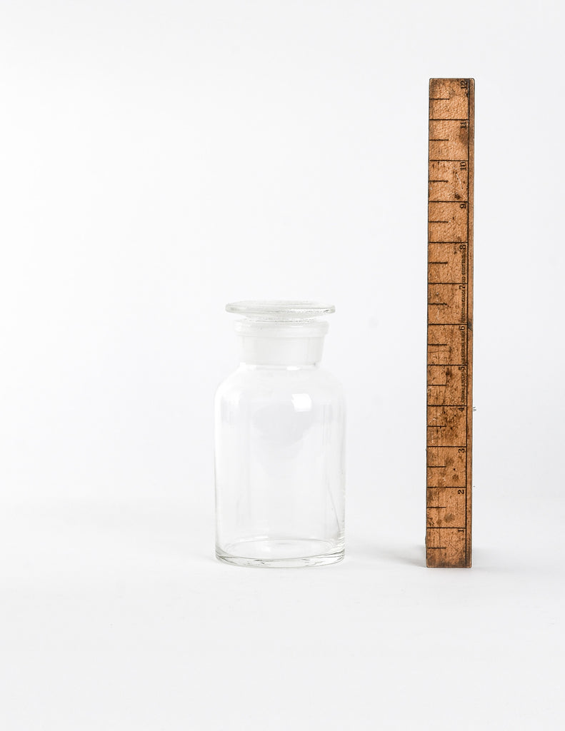 Large Apothecary Jar next to a vertical wooden ruler showing a height of 6.5"
